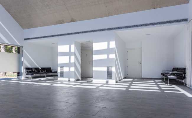 The emblematic Tanatorium for greeting the dead caressed by a mystical light